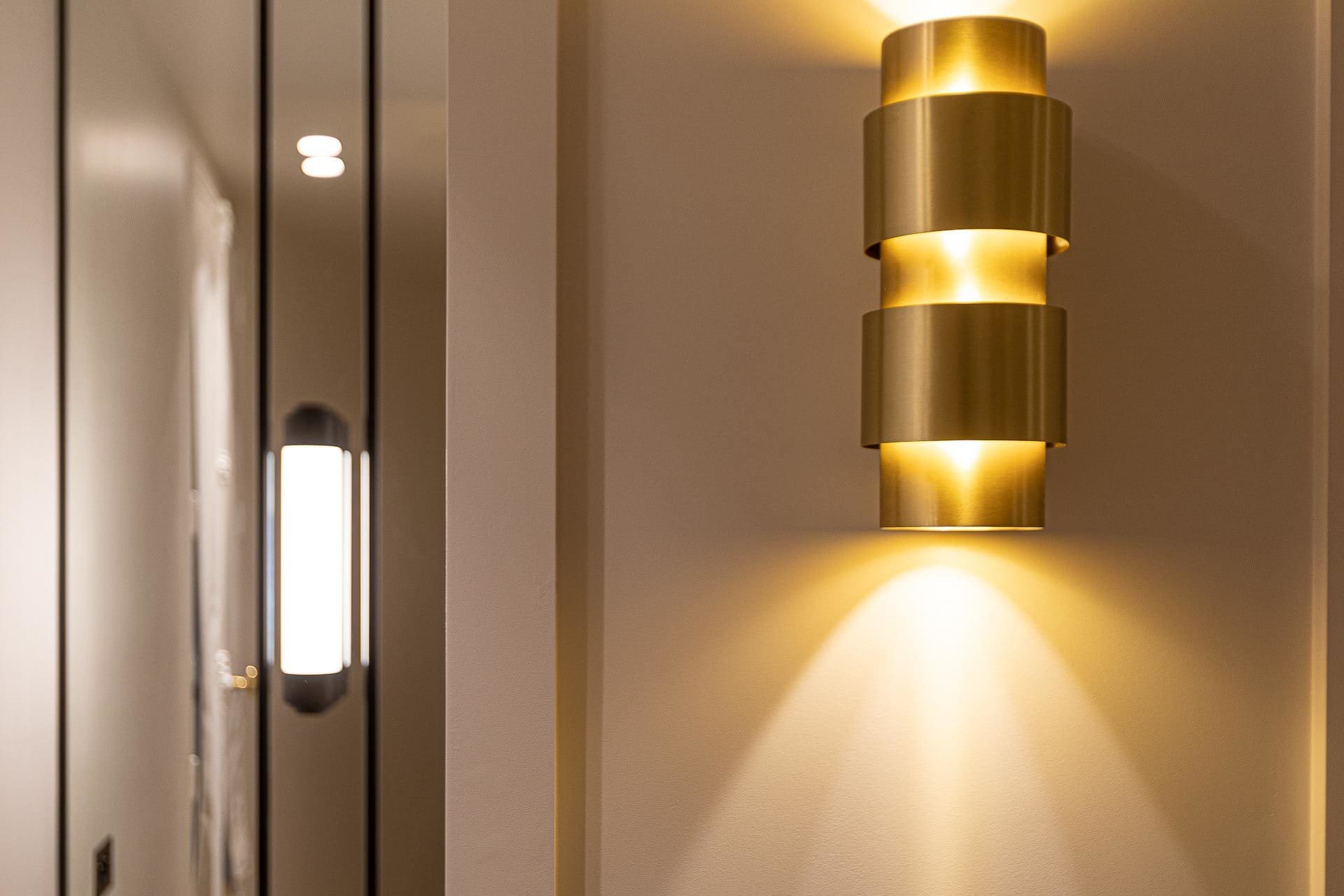 Design of wall lamp in a luxury apartment
